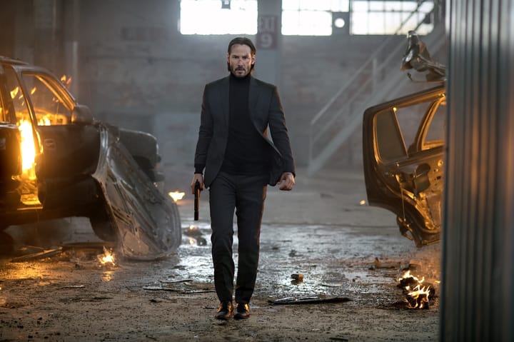 How many people has John Wick killed onscreen?